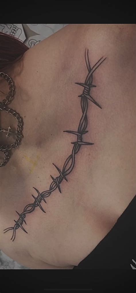 barbed wire finger tattoo|barbed wire collar bone tattoo.